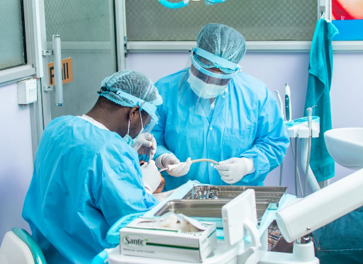 dentists at deans dental clinic treating a patient